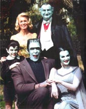 The Munsters (left to right): Butch Patrick, Beverley Owen, Fred Gwynne, Al Lewis and Yvonne DeCarlo