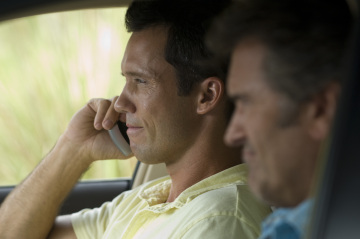 BURN NOTICE -- "Scatter Point" Episode 205 -- Pictured: (l-r) Jeffrey Donovan as Michael Westen, Bruce Campbell as Sam Axe -- USA Network Photo: Glenn Watson 