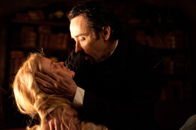 John Cusack plays Edgar Allen Poe and Alice Eve as Emily Hamilton in the Relativity Media film "The Raven."