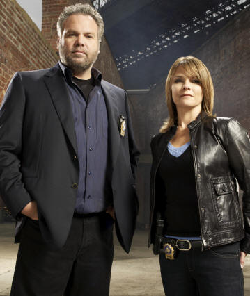 LAW & ORDER: CRIMINAL INTENT -- Pictured: (l-r) Vincent D'onofrio as Detective Robert Goren, Kathryn Erbe as Detective Alexandra Eames -- USA Network Photo: Miranda Penn Turin 