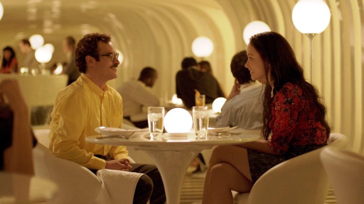 Joaquin Phoenix and Olivia Wilde star in 'Her.'