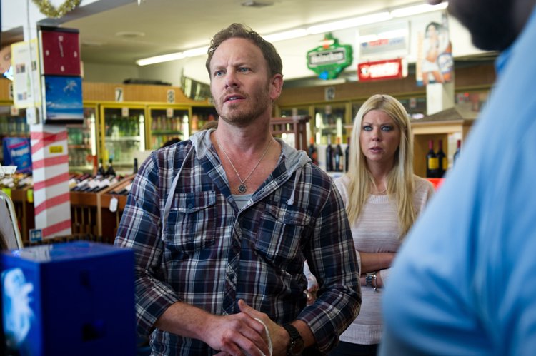 SHARKNADO -- "Syfy Original Movie" -- Pictured: (l-r) Ian Ziering as Fin, Tara Reid as April -- (Photo by: Syfy)