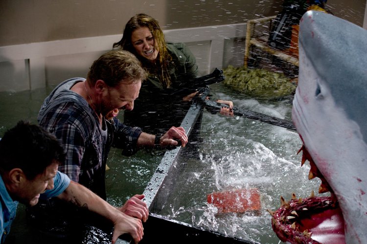 SHARKNADO -- "Syfy Original Movie" -- Pictured: (l-r) Ian Ziering as Fin, Cassie Scerbo as Nova -- (Photo by: Syfy)