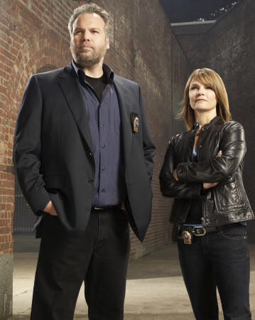 LAW & ORDER: CRIMINAL INTENT -- Pictured: (l-r) Vincent D'onofrio as Detective Robert Goren, Kathryn Erbe as Detective Alexandra Eames -- USA Network Photo: Miranda Penn Turin 